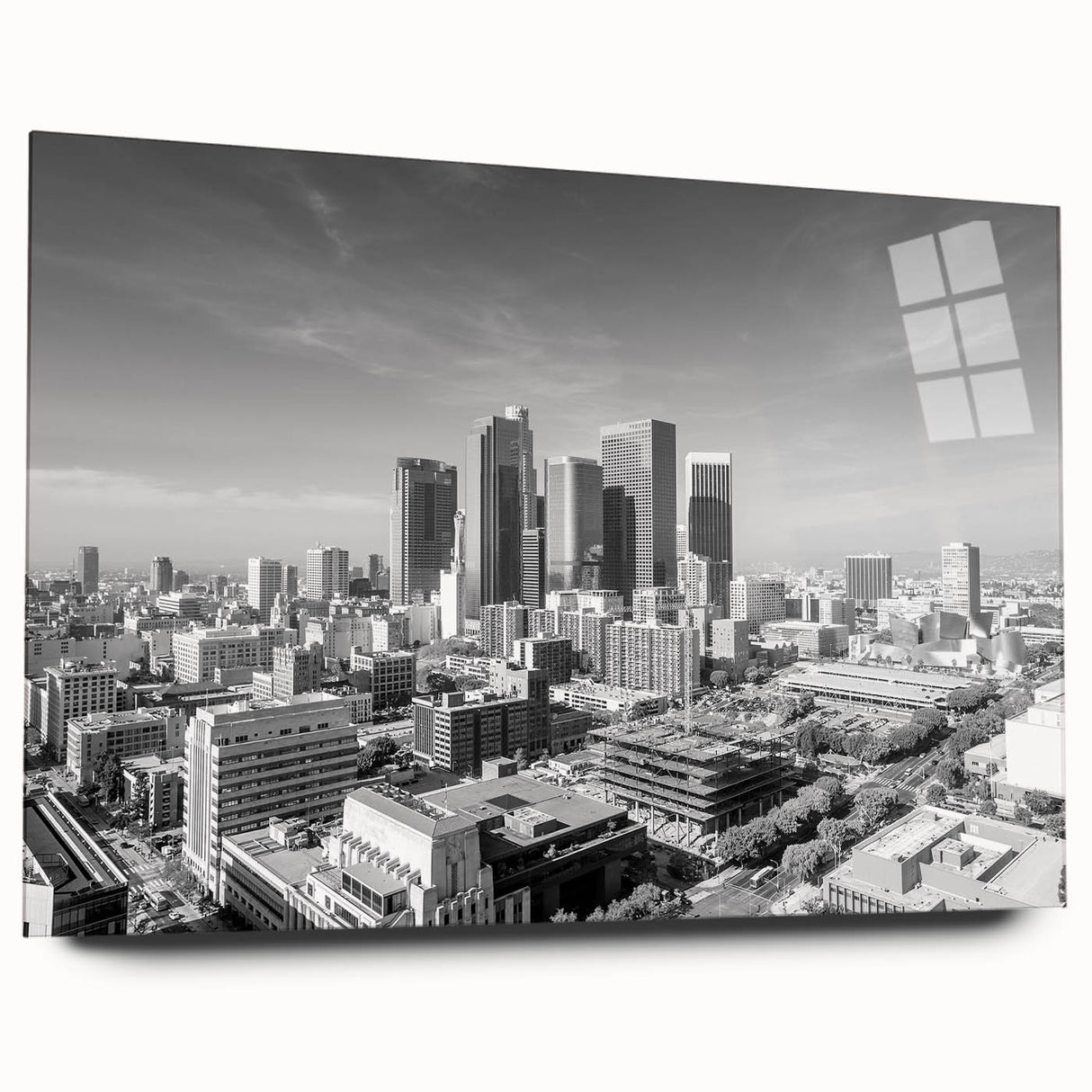 Large abstract wall art print featuring swirling shades of blue and gray, ideal for bedroom or dining room ambiance.