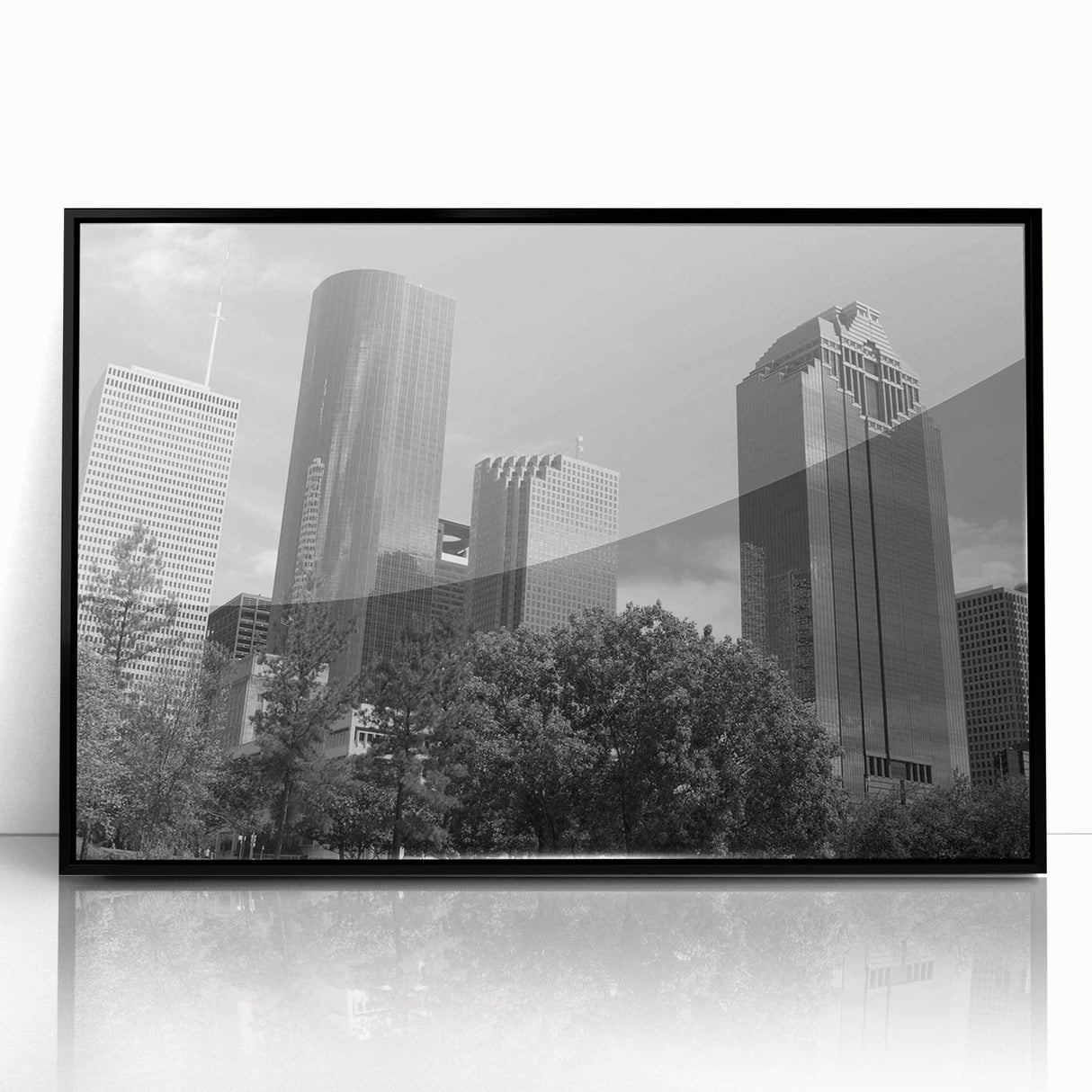 Large abstract wall art depicting geometric shapes in bold orange and black colors on canvas.