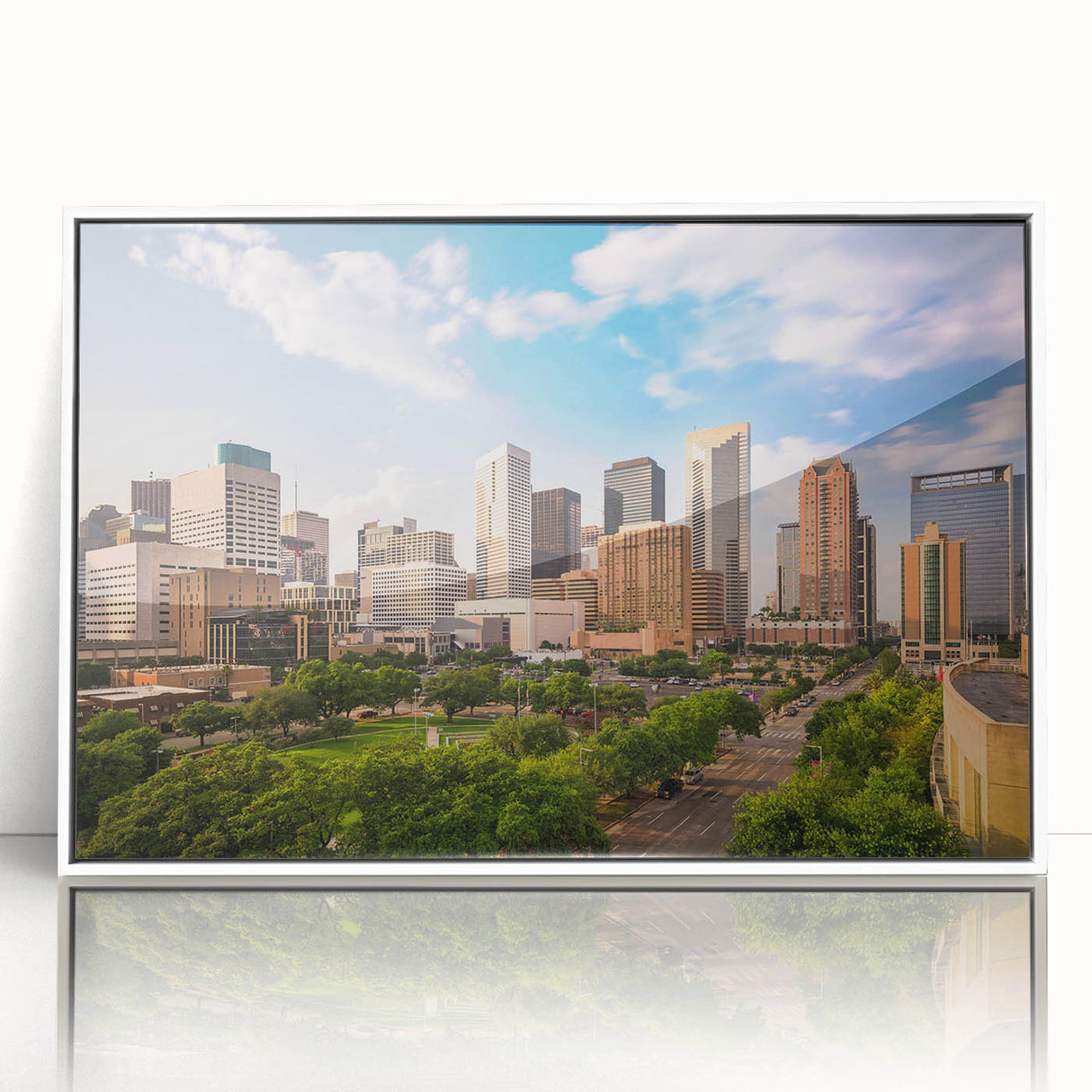 Art deco poster featuring geometric patterns in bold black and gold, printed on a framed canvas.