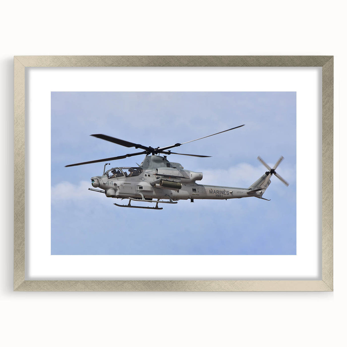 Textured abstract art print in muted gray and blue tones on canvas, suitable for modern bedroom decor.