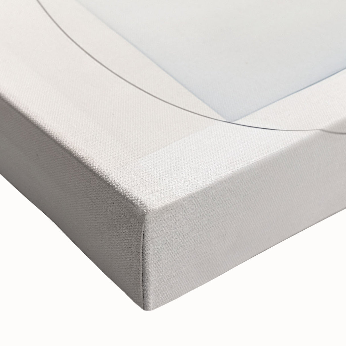 Close-up view of an abstract minimalist design stretched canvas wall art, showcasing a blend of soft beige and gray tones, ideal for modern home decor.