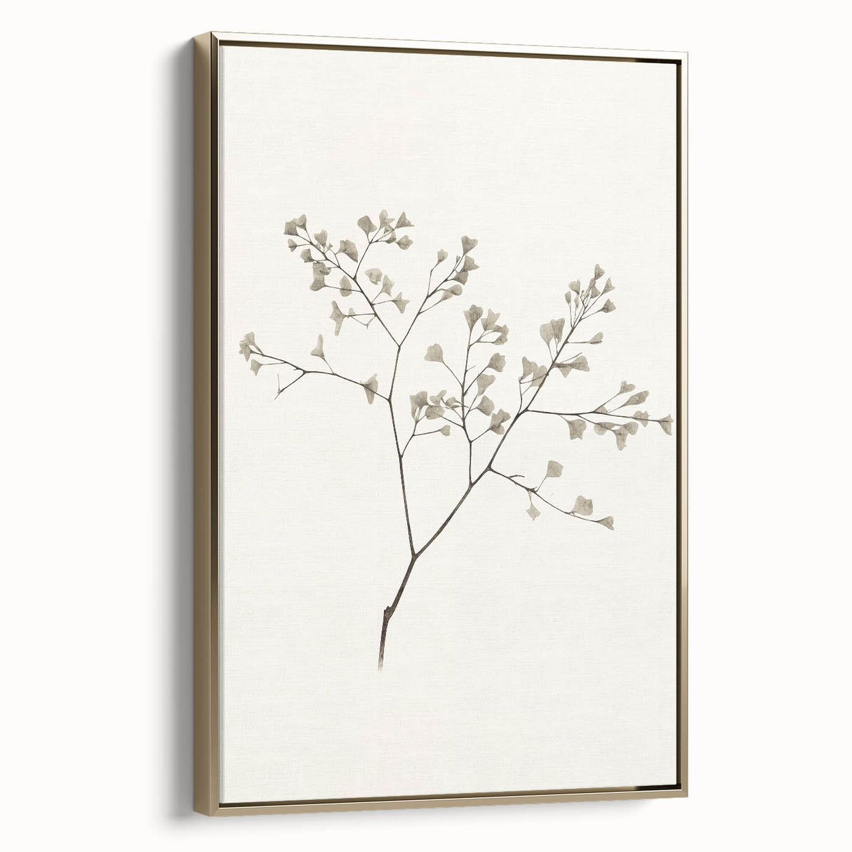 Framed canvas artwork showcasing an abstract minimalist design with gold accents, displayed from the side to highlight its elegant profile and texture.