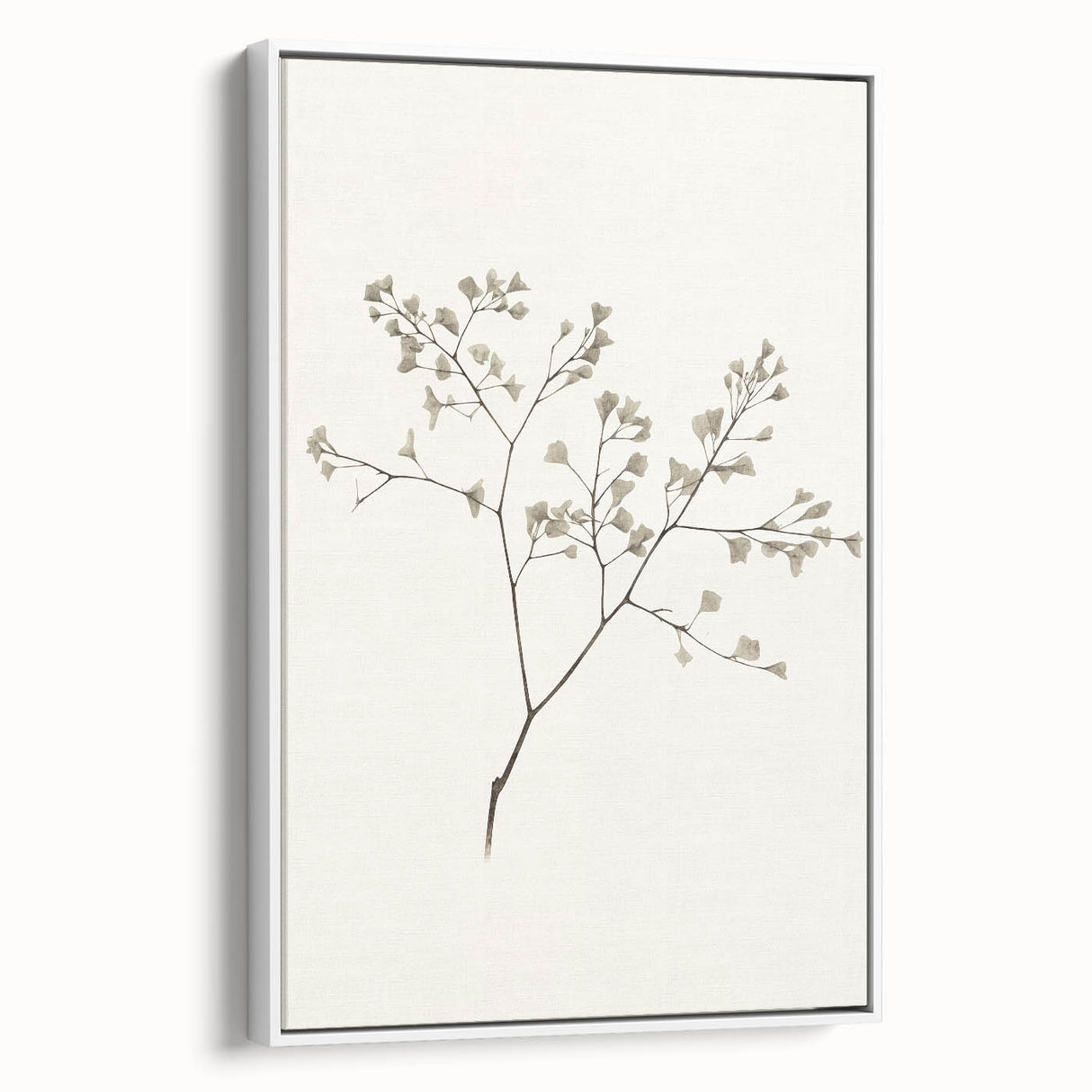 Framed canvas wall art showcasing an abstract minimalist design with a predominantly white background, elegantly displayed from a side view, ideal for modern home decor.