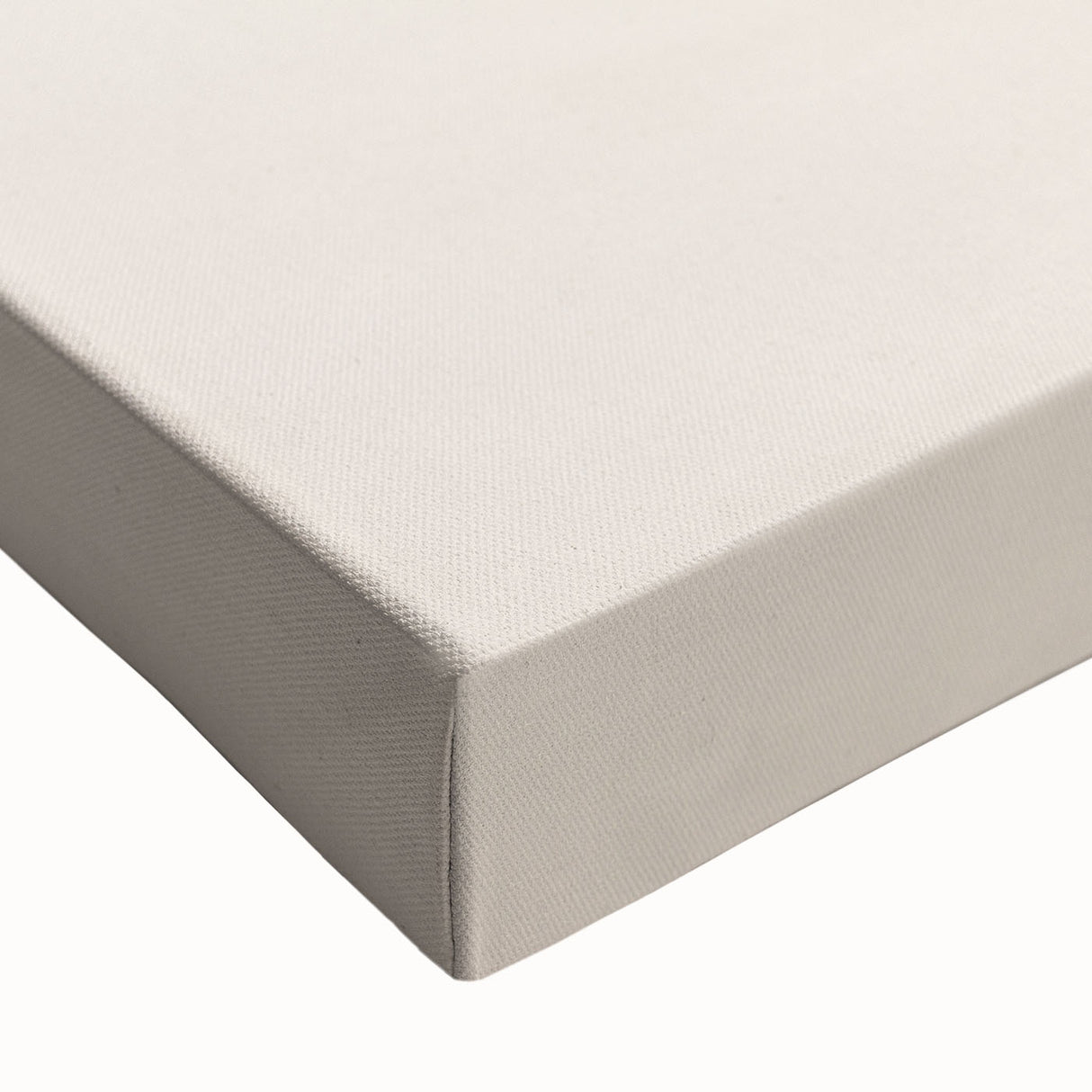 Close-up of a stretched canvas showcasing an abstract minimalist design in muted tones, perfect for modern decor, highlighting texture and artistic detail.