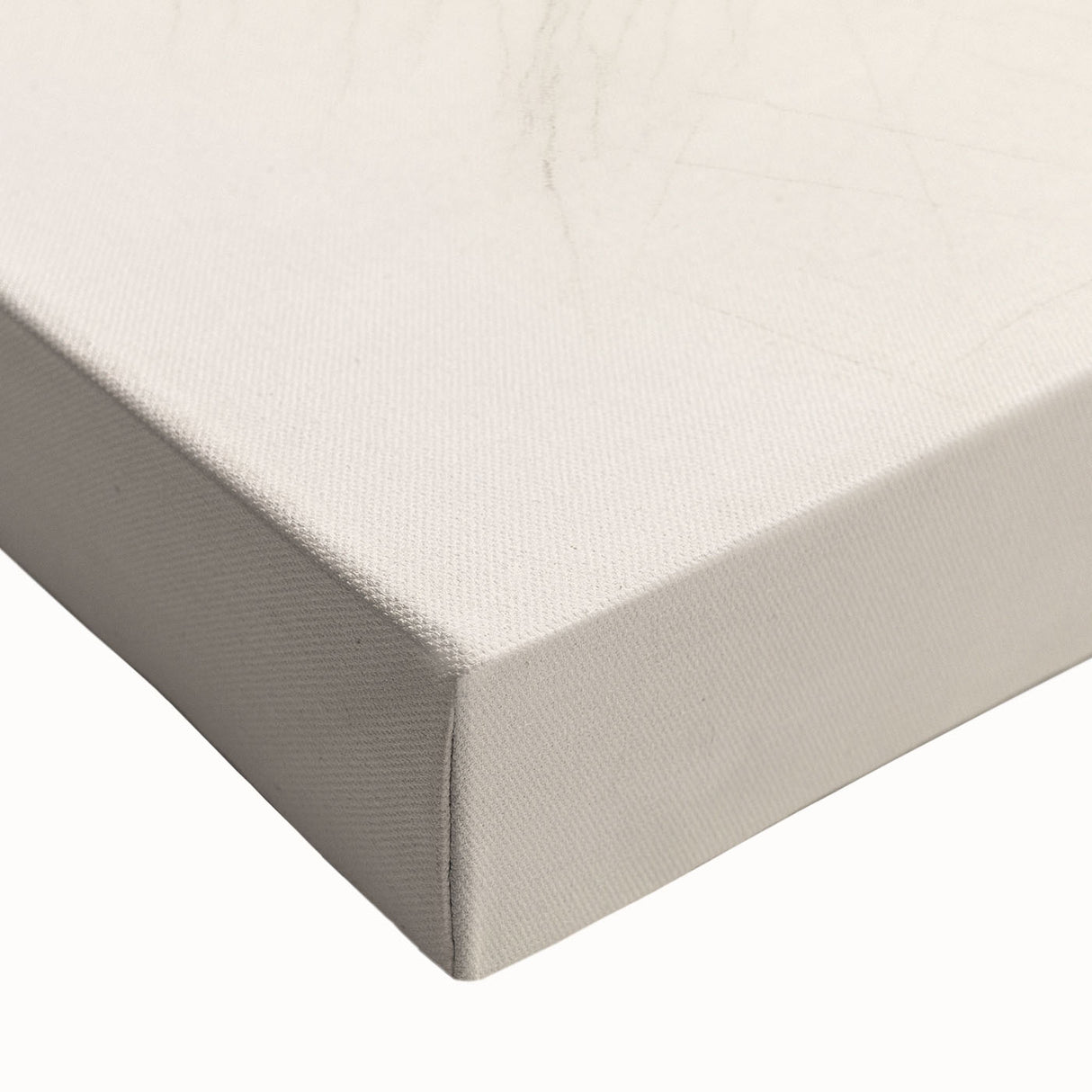 Close-up of a stretched canvas showcasing an abstract minimalist design with soft pastel colors and geometric shapes, perfect for modern home decor.