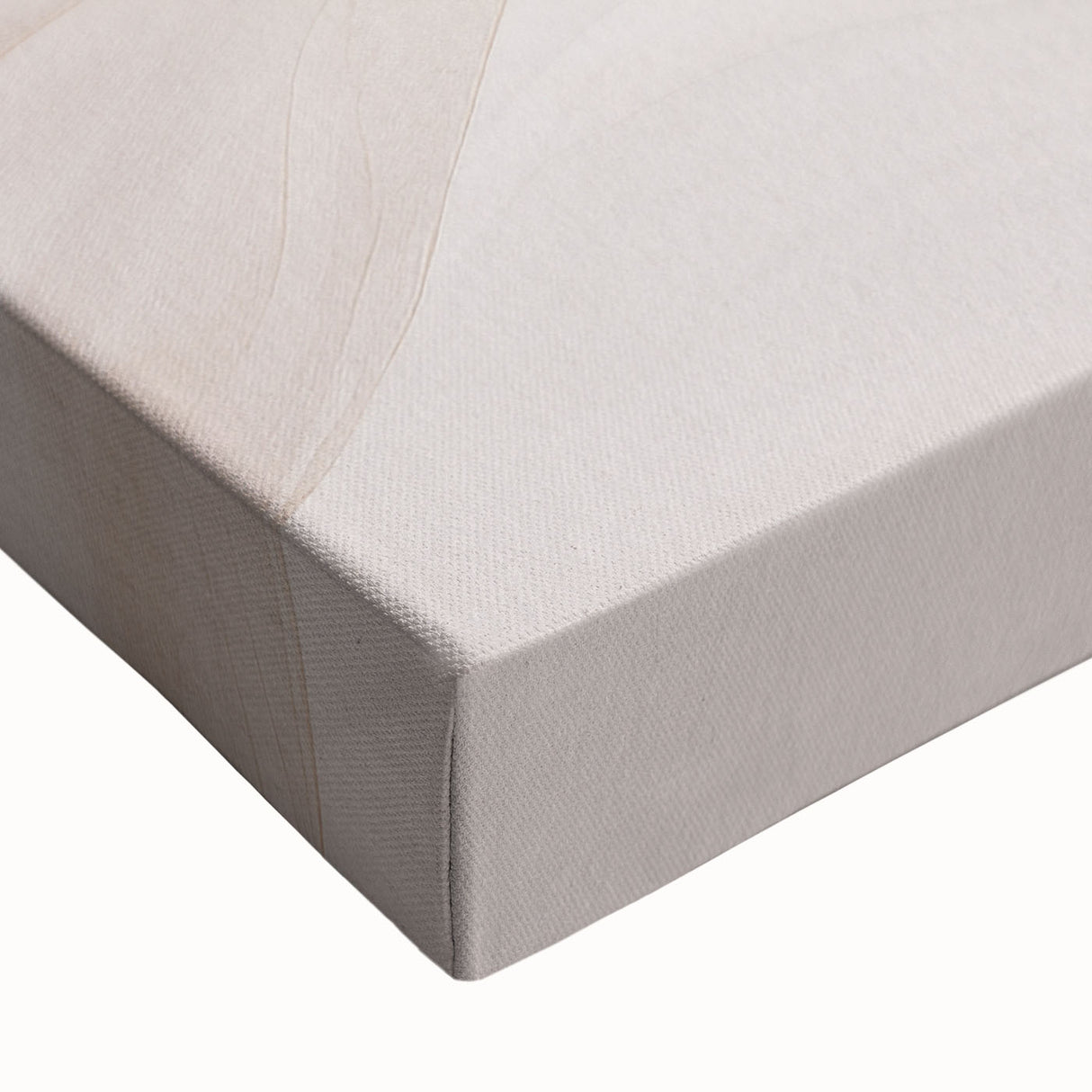 Close-up of a stretched canvas showcasing an abstract modern design with vivid colors and intricate patterns, perfect for enhancing contemporary home decor.