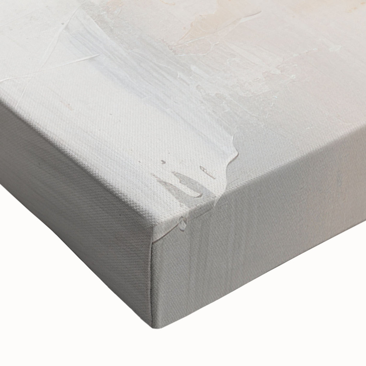 Close-up of a stretched canvas showcasing an abstract modern design in vibrant colors, ideal for contemporary home decor, emphasizing bold shapes and textures.