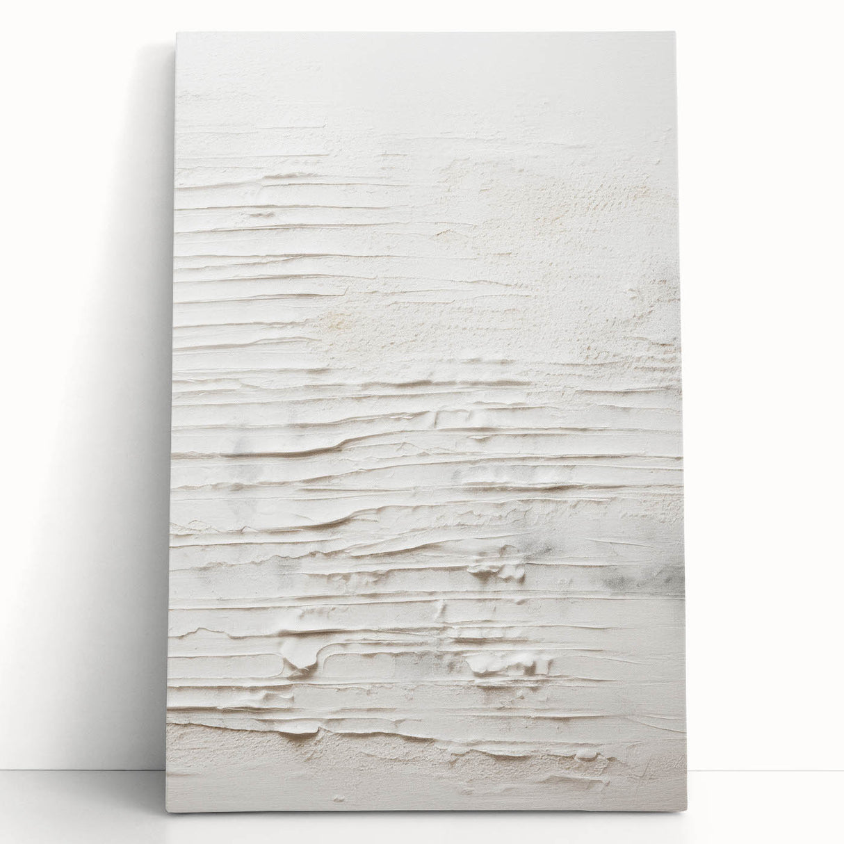 Abstract modern wall art collection featuring vibrant colors and geometric shapes on stretched canvas, leaning against a neutral wall for display. Perfect for contemporary home decor.