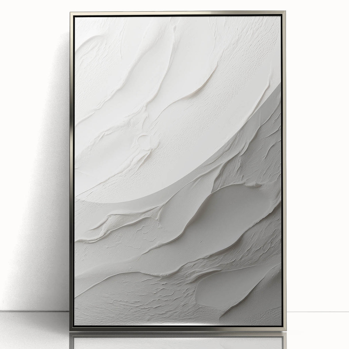 Framed modern abstract wall art featuring a sleek silver design, showcasing dynamic shapes and textures, perfect for contemporary home decor.
