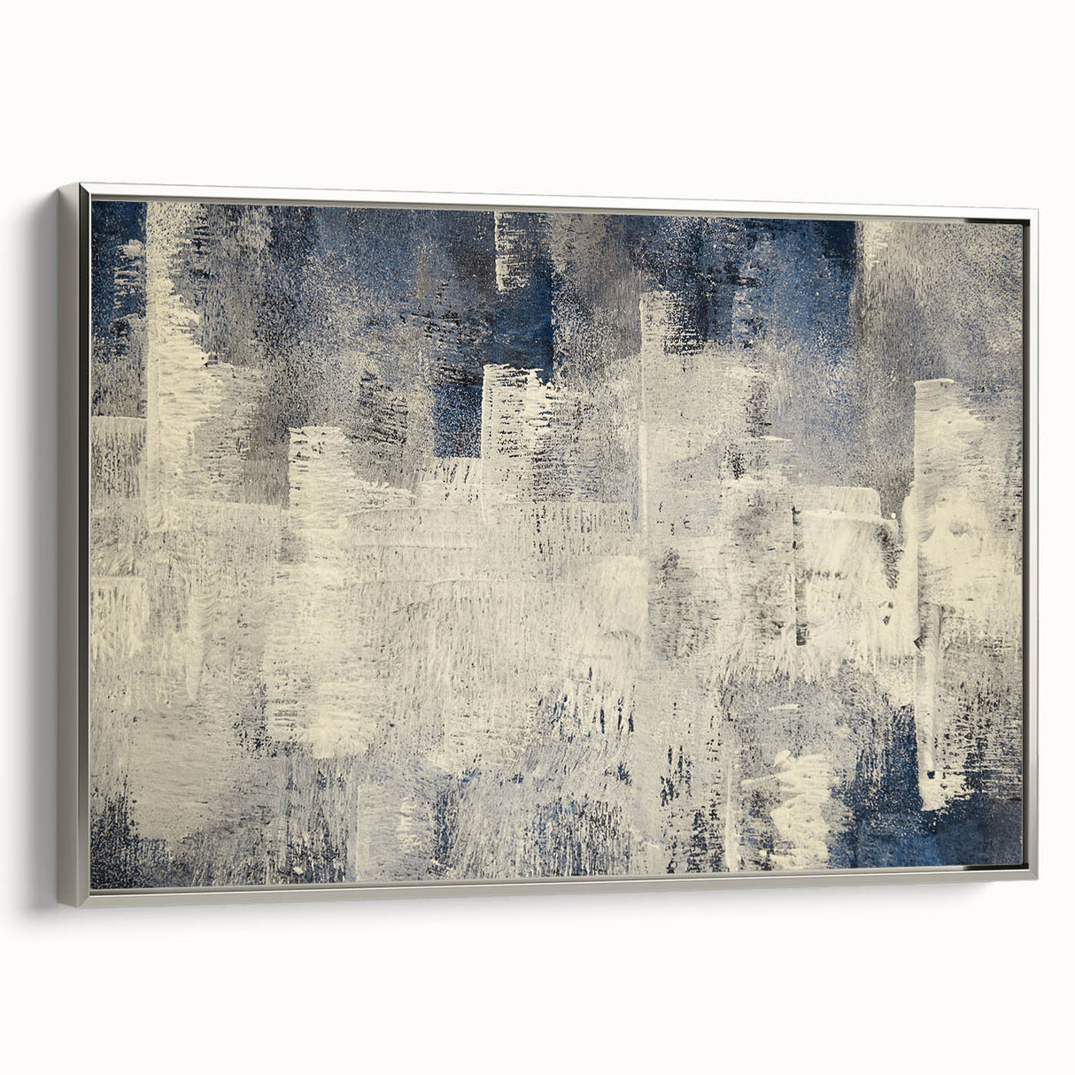 Framed canvas artwork showcasing an abstract design with strokes and lines in silver hues, highlighting modern elegance and sophistication for home decor.