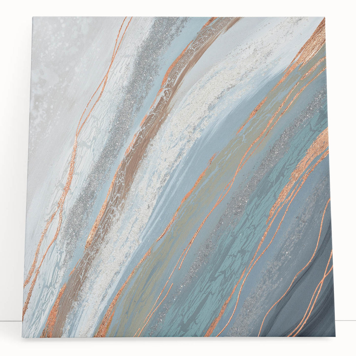 Abstract canvas wall art design featuring vibrant strokes and lines in hues of blue, orange, and yellow, elegantly leaning against a neutral wall, perfect for modern decor.