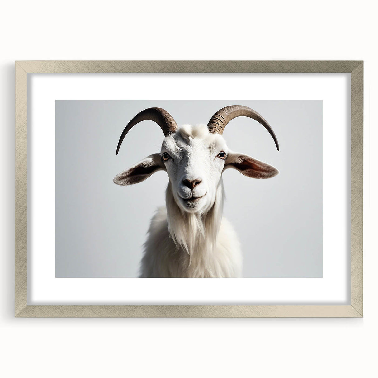 Framed wall art featuring a striking goat design, set in a silver frame with a mat. Ideal for animal lovers, this piece adds a touch of elegance to any decor.