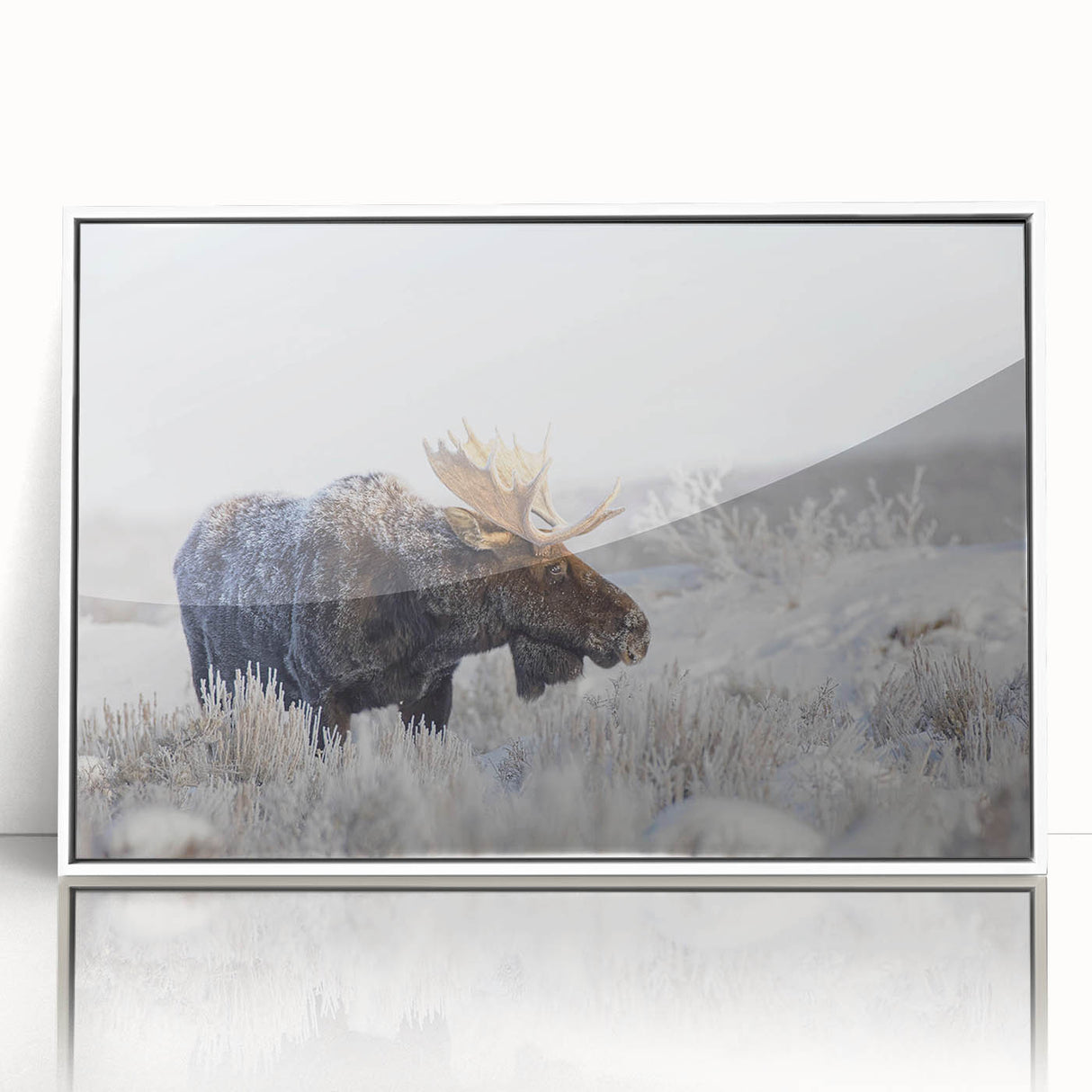 Framed wall art featuring a serene design of moose and elk in a natural landscape, showcasing earthy colors and intricate details, perfect for wildlife enthusiasts.