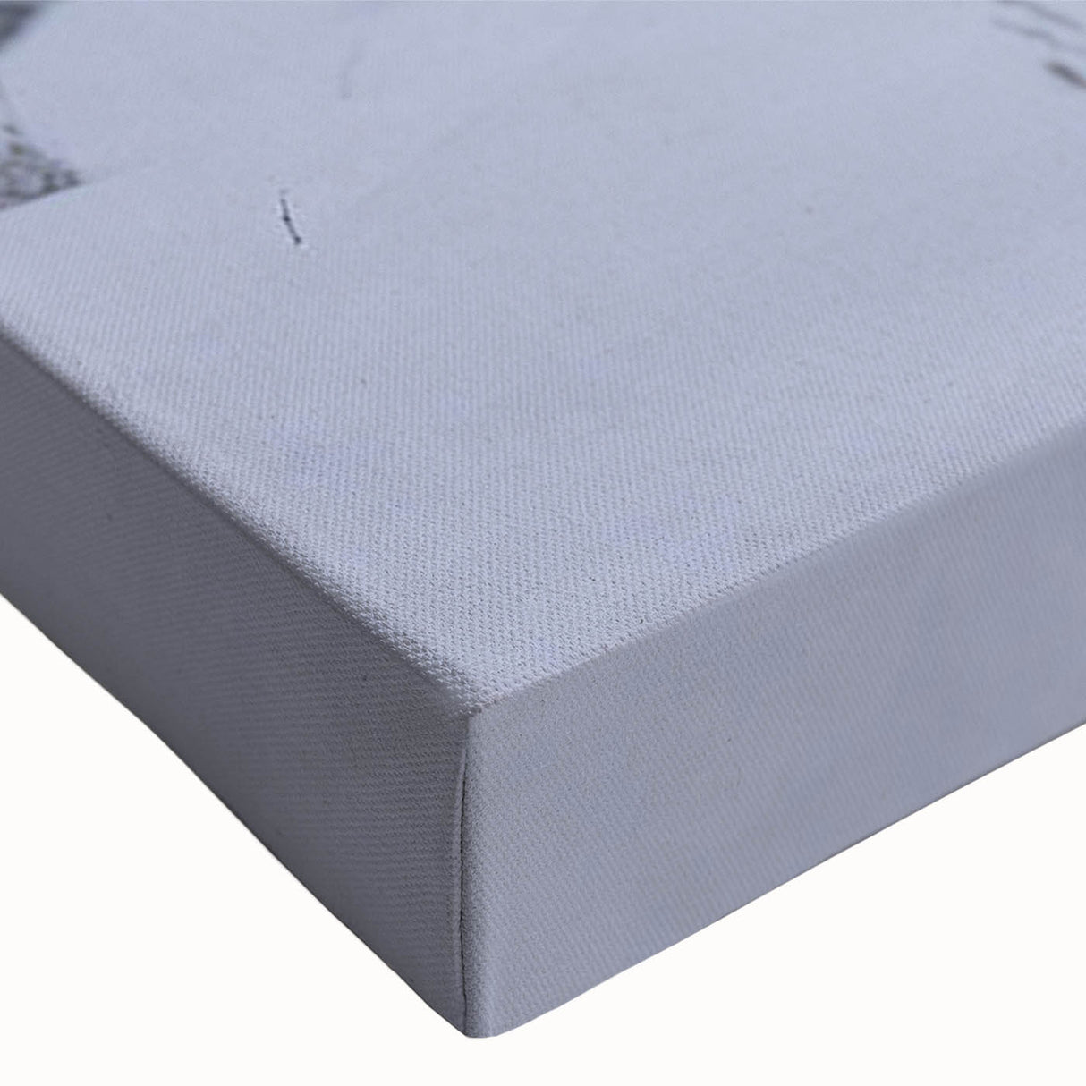 Close-up of a stretched canvas featuring a detailed wildlife design showcasing a moose and elk in a natural setting, perfect for nature-themed home decor.