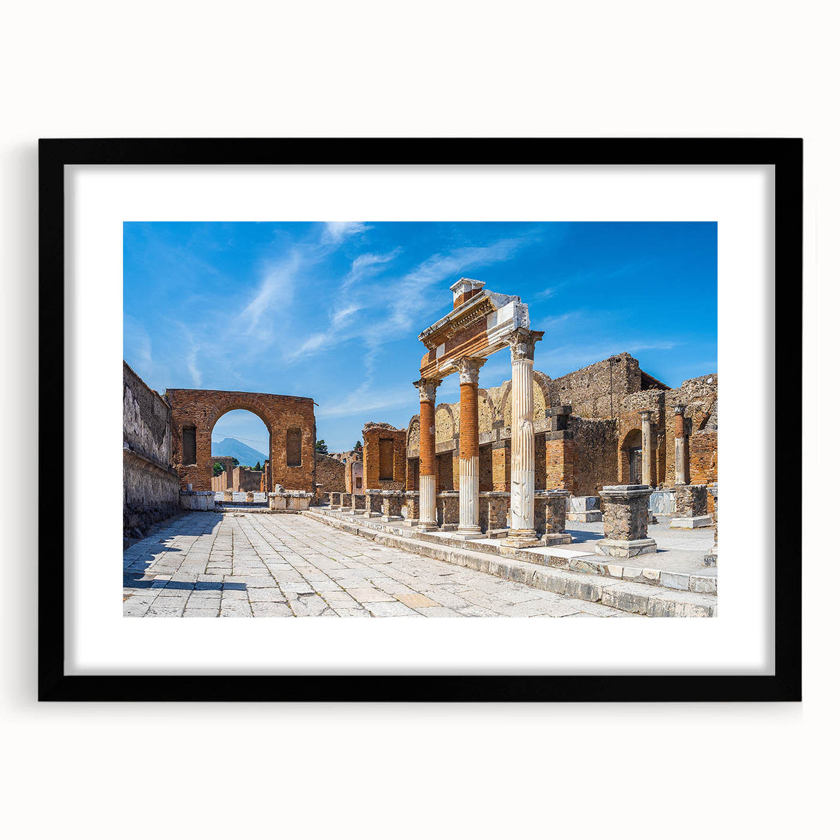 Extra large, textured abstract art print depicting colorful ancient ruins, framed in black, ideal for living room decor.
