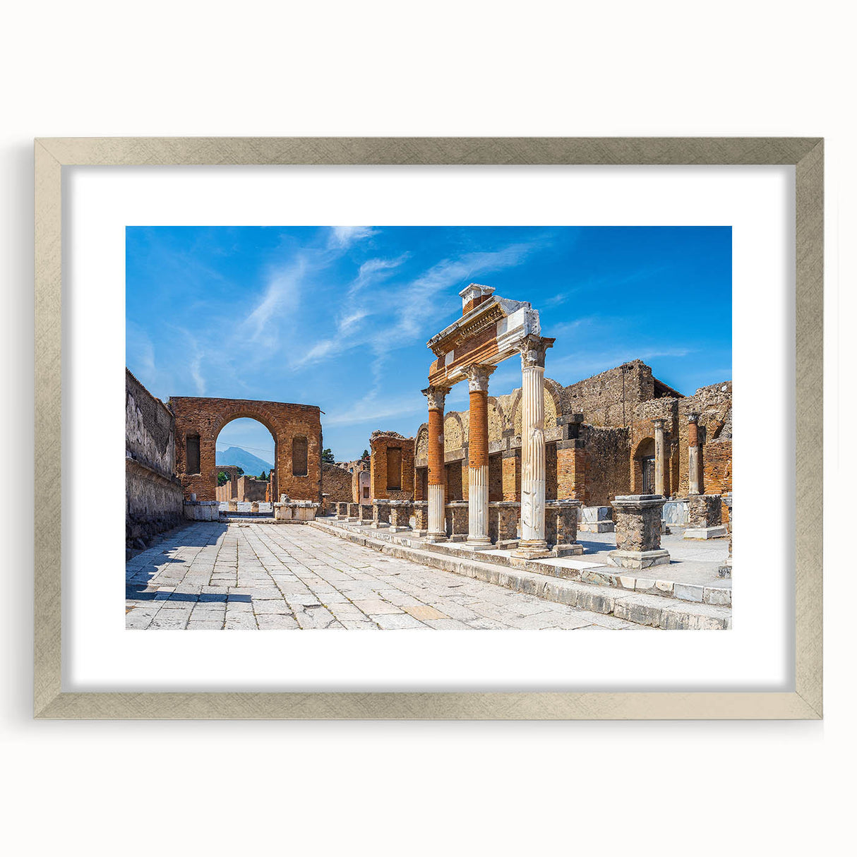 Textured art depicting ancient ruins in muted earth tones, framed in silver, ideal for bedroom ambiance.