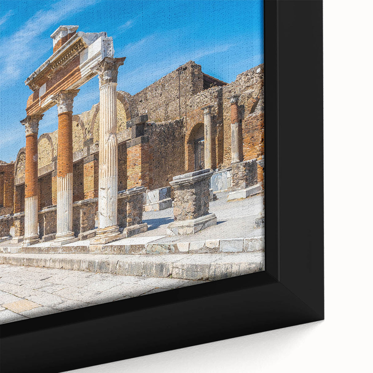 Framed canvas featuring a close-up of ancient ruins in textured black with colorful accents, ideal for living room decor.