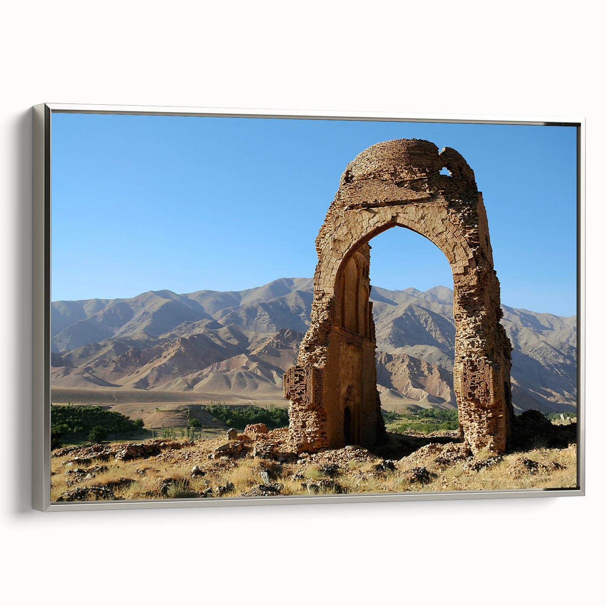 Framed canvas featuring an ancient ruins landscape in muted earth tones, ideal for a sophisticated office setting.