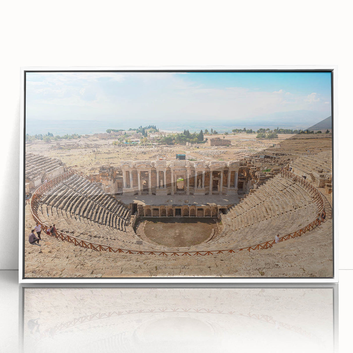 Art deco poster of ancient ruins in muted beige and ivory, acrylic print in a white frame.