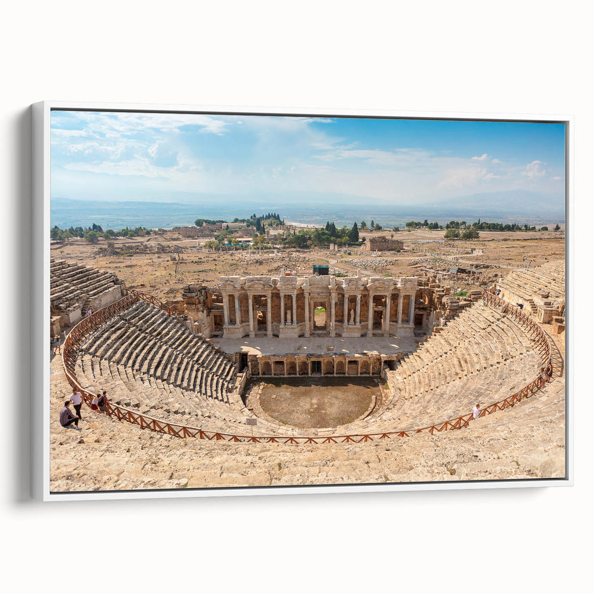 Framed canvas of vintage poster art depicting colorful ancient ruins, ideal for living room decor.