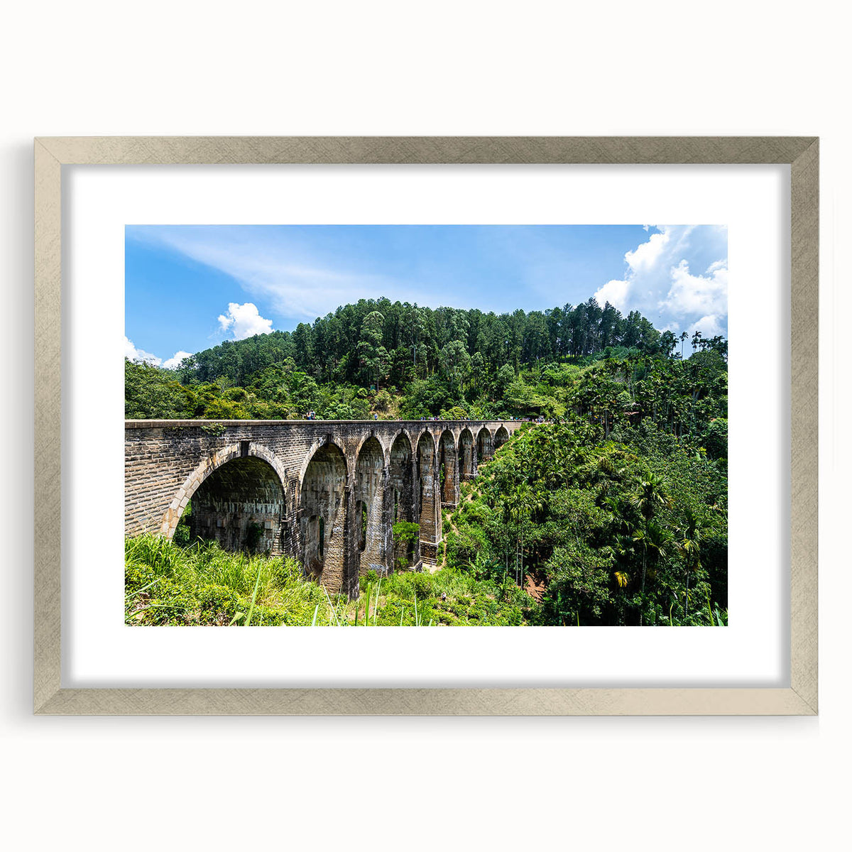 Textured abstract art print showcasing curved architectural forms in neutral tones, framed in silver.