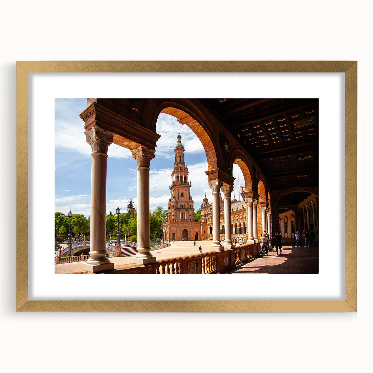 Abstract art print featuring interconnected arches in muted gold and white, framed in gold.