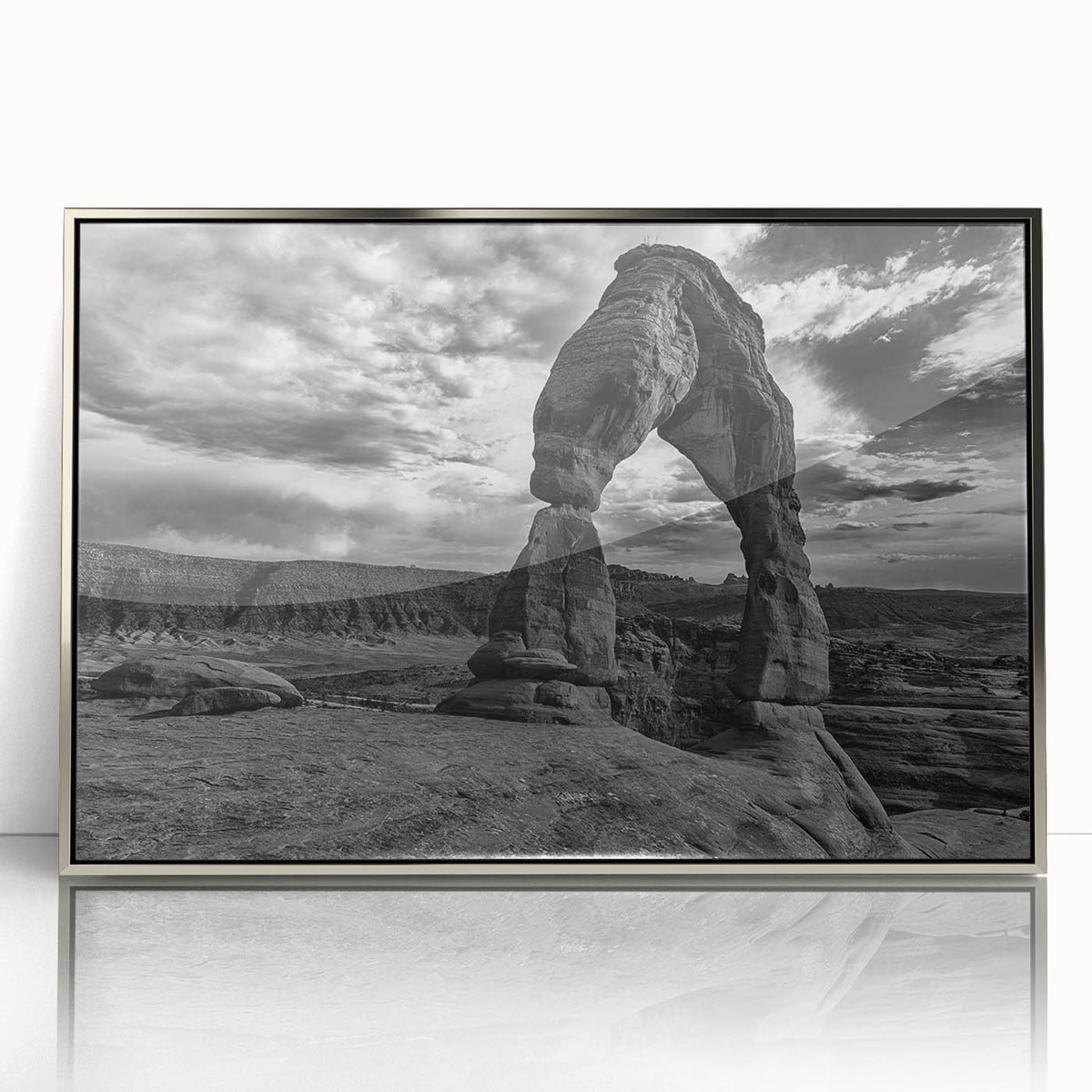 Large art print of mid-century modernist arches in neutral tones, framed in silver acrylic, suitable for modern decor.