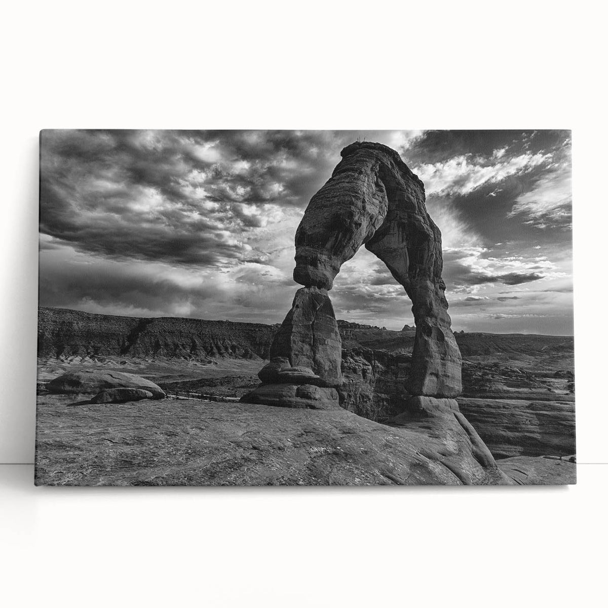 Black and white photo of architectural arches printed on large stretched canvas, ideal for kitchen wall art.