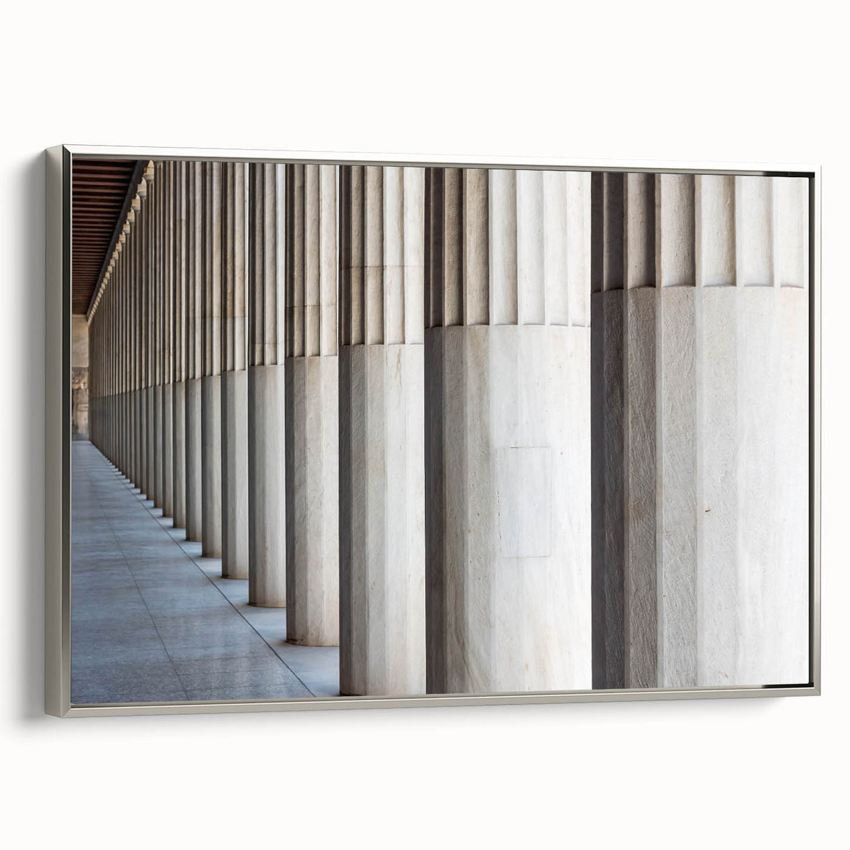 Framed canvas featuring a black and white vintage poster of architectural columns, ideal for office decor.
