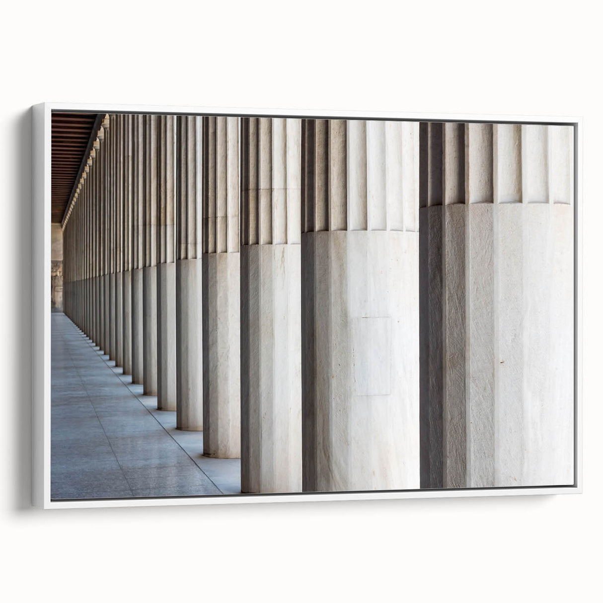 Vintage poster art of architectural columns in black and white on a framed canvas, suitable for living room decor.