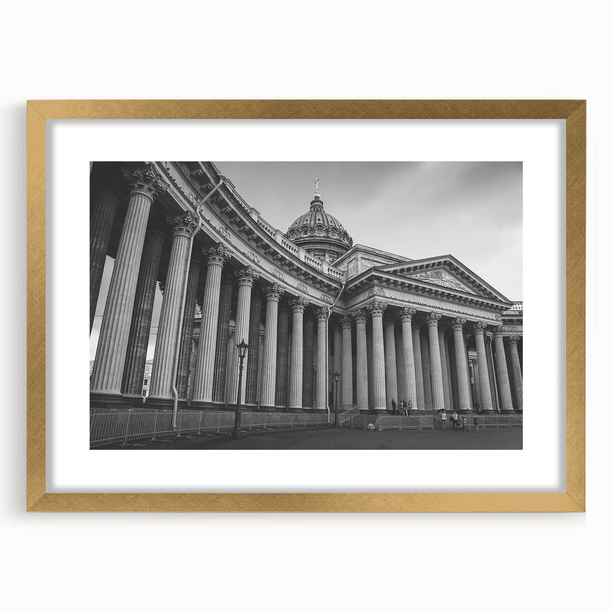 Extra large abstract art print featuring textured columns in muted gold tones on a framed canvas.