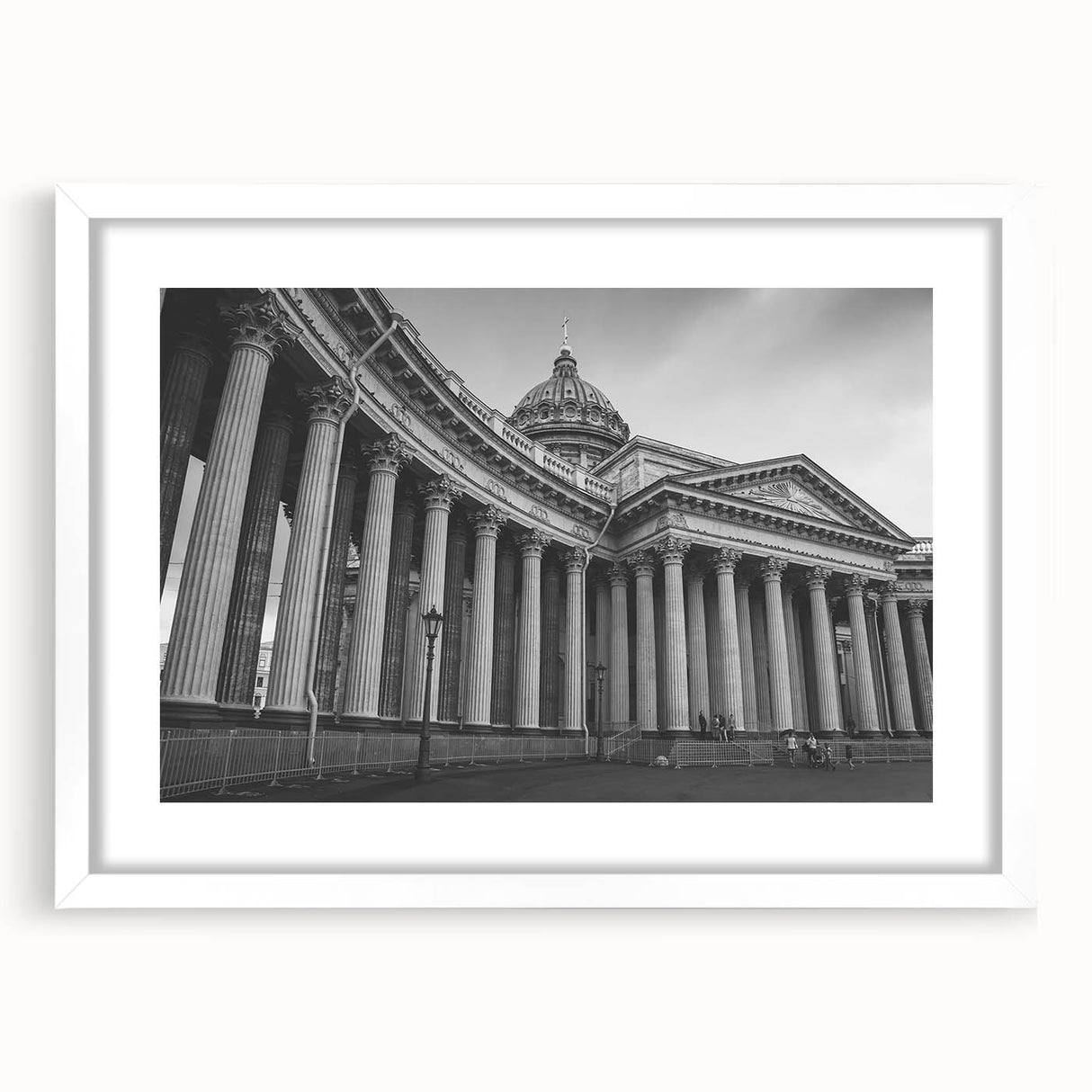 Textured abstract art print depicting layered columns in muted beige, ideal for bedroom wall art, framed with a white mat.