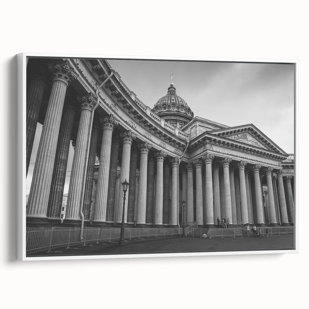 Vintage poster art featuring architectural columns in black and colorful accents on a large framed canvas.