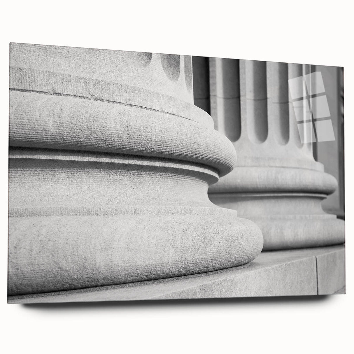 Large abstract wall art on acrylic showing fluid geometric shapes in monochrome tones.