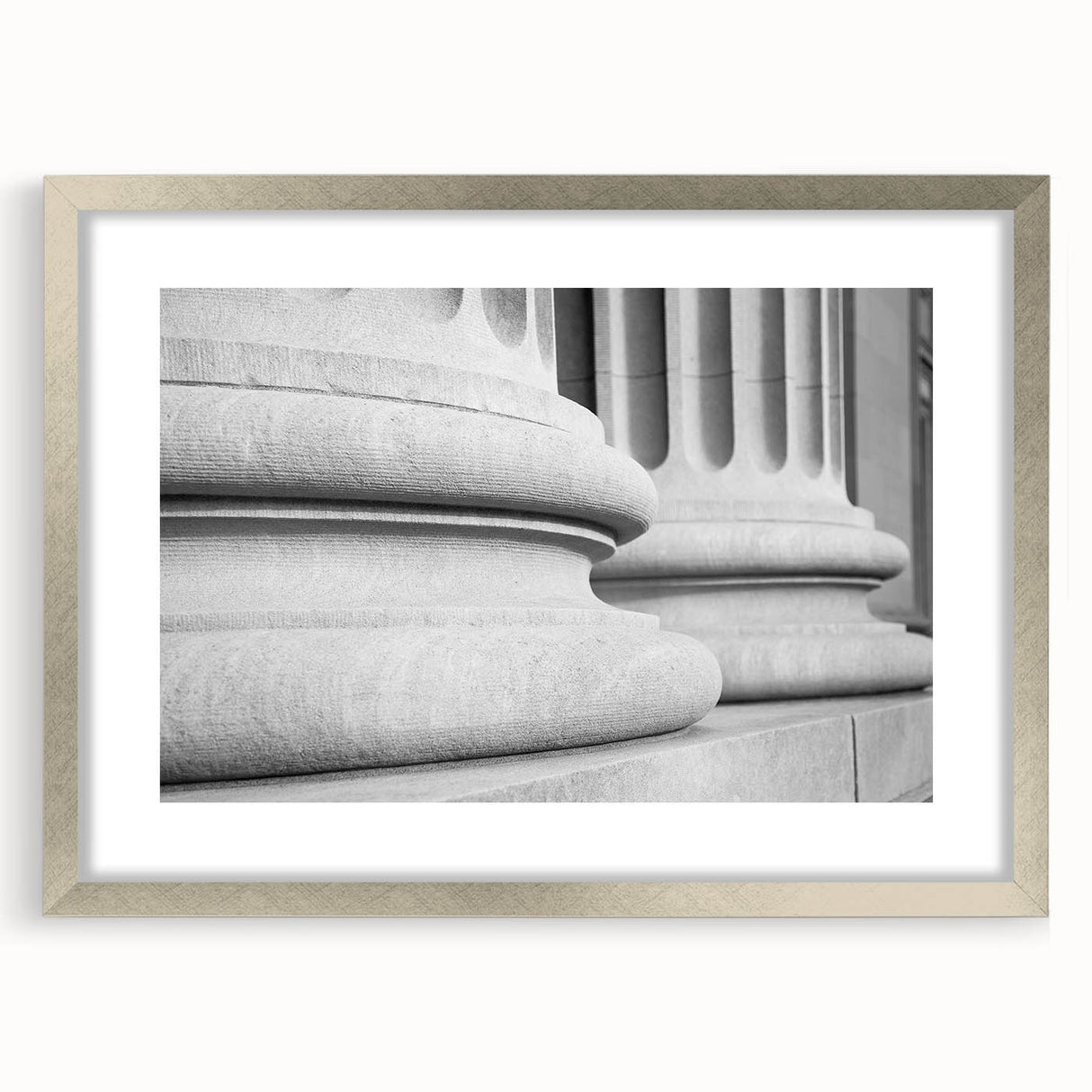 Textured abstract art print of architectural columns in silver frame, ideal for bedroom ambiance.