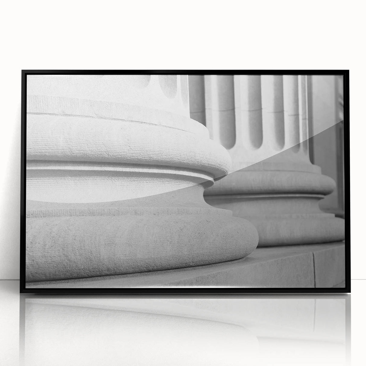 Large abstract wall art featuring black and white architectural columns in a mid-century modernist style on framed acrylic.
