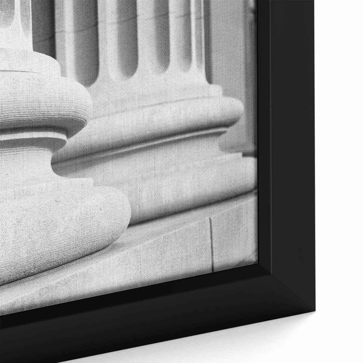 Close-up of black wall art featuring colorful, textured columns design on a large framed canvas.