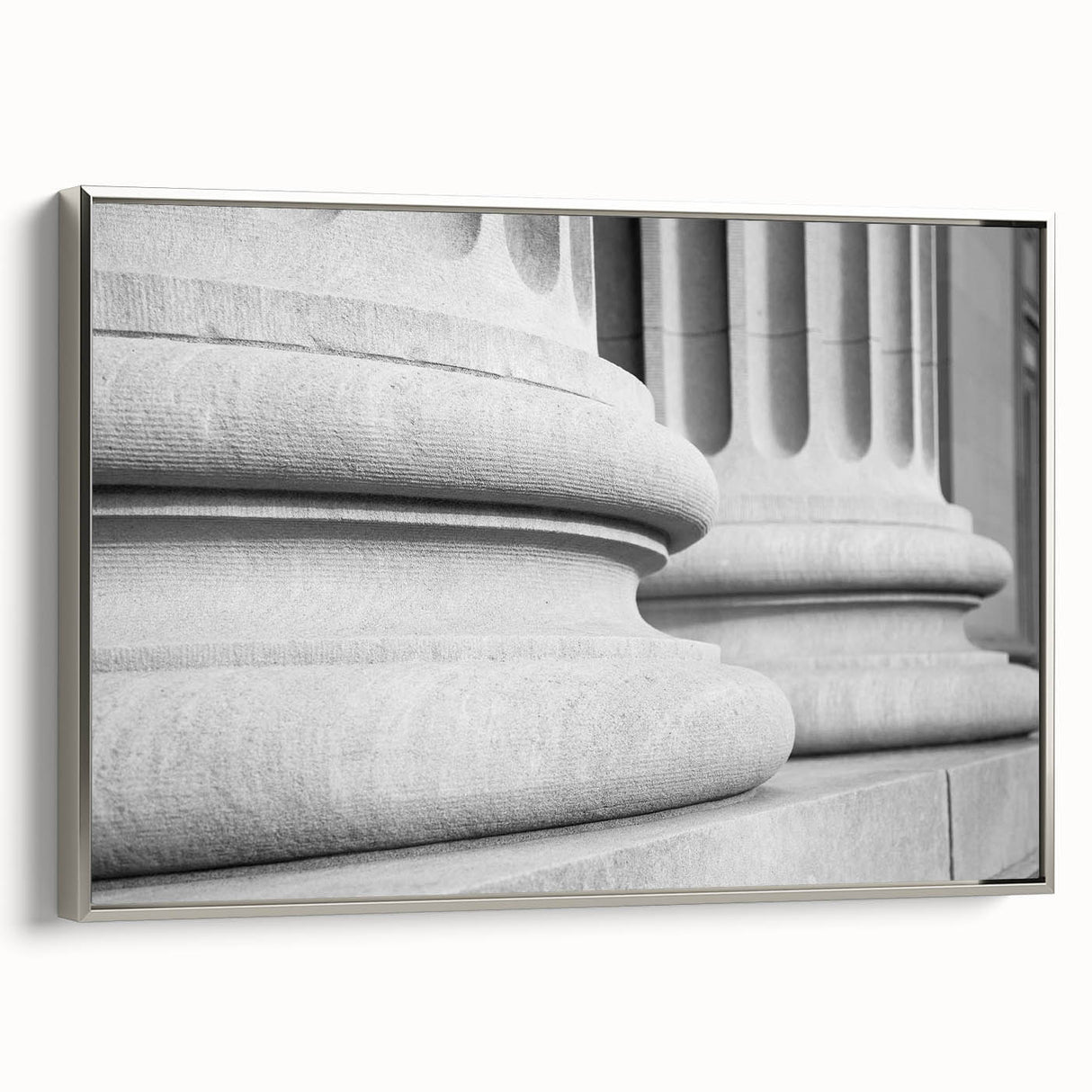 Framed canvas featuring a grayscale vintage poster of classical architectural columns, suitable for office or study decor.