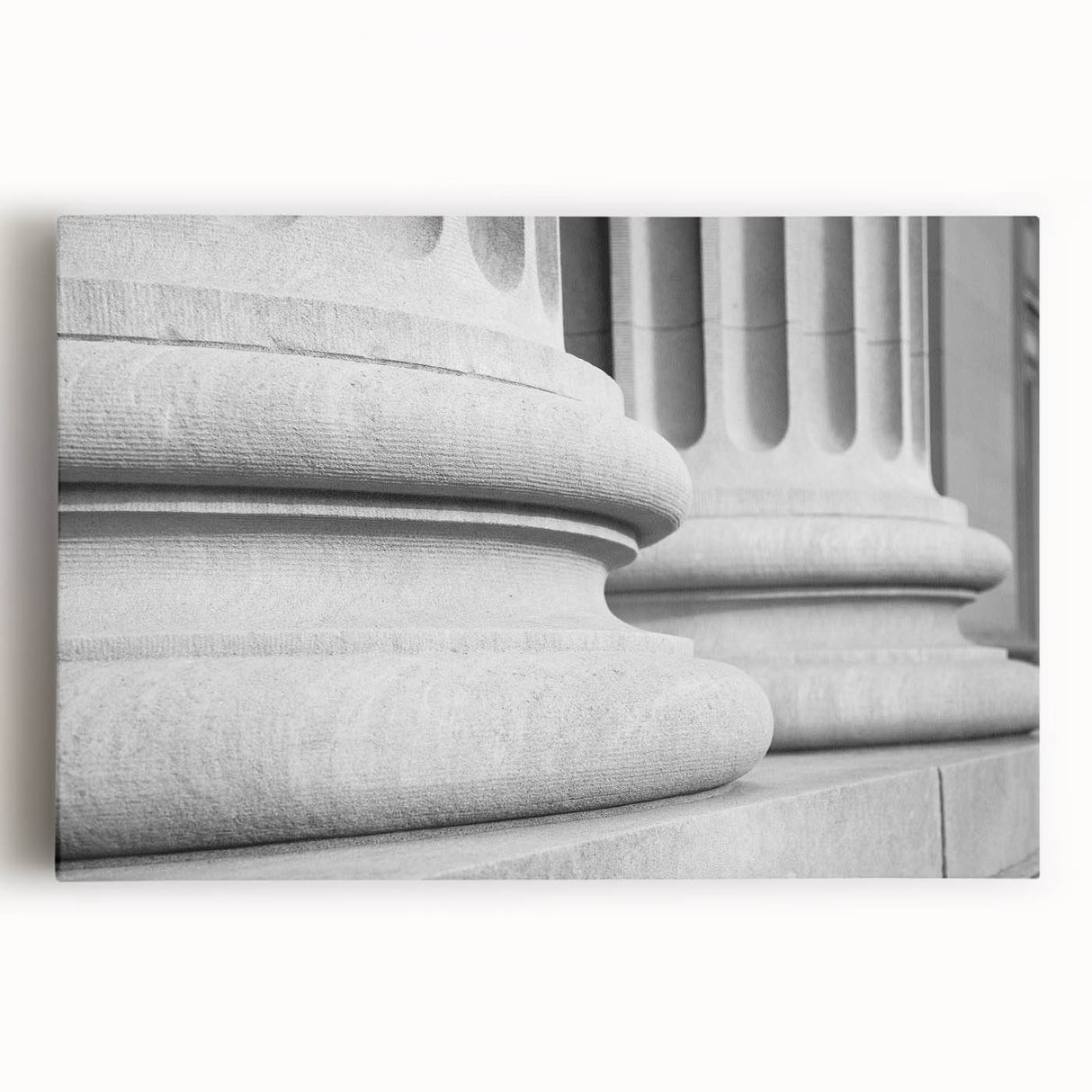 Black and white photo of classical columns on stretched canvas, ideal for kitchen wall art.