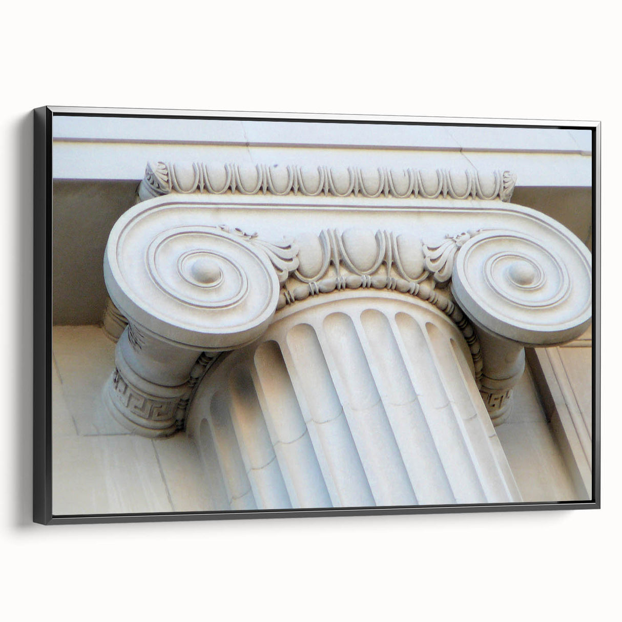 Black and white wall art featuring a vintage poster art style landscape with architectural columns on framed canvas.