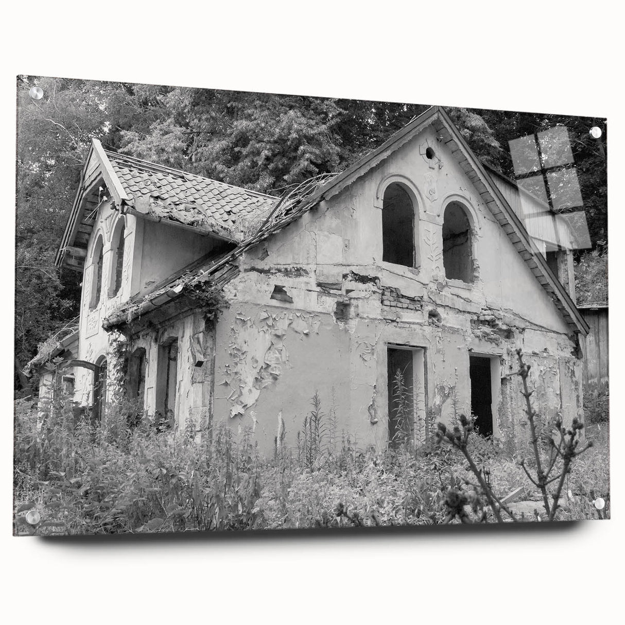 Large abstract wall art on acrylic glass depicting a derelict building in muted gray tones.
