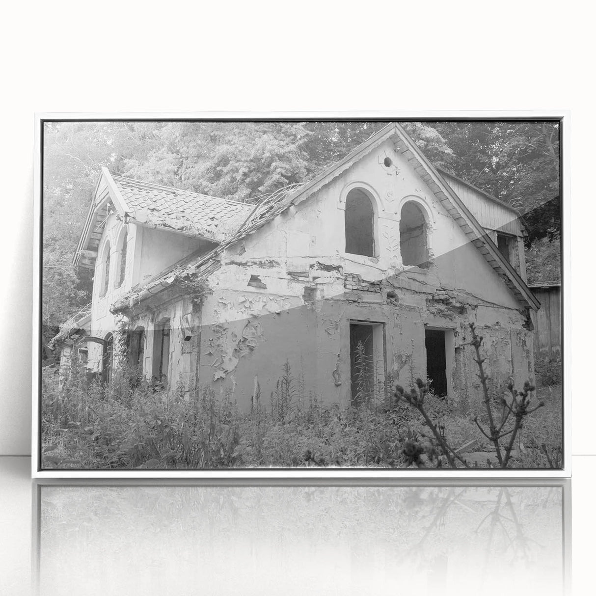 Art deco poster featuring a geometric design in muted gold and black tones on a white acrylic frame.