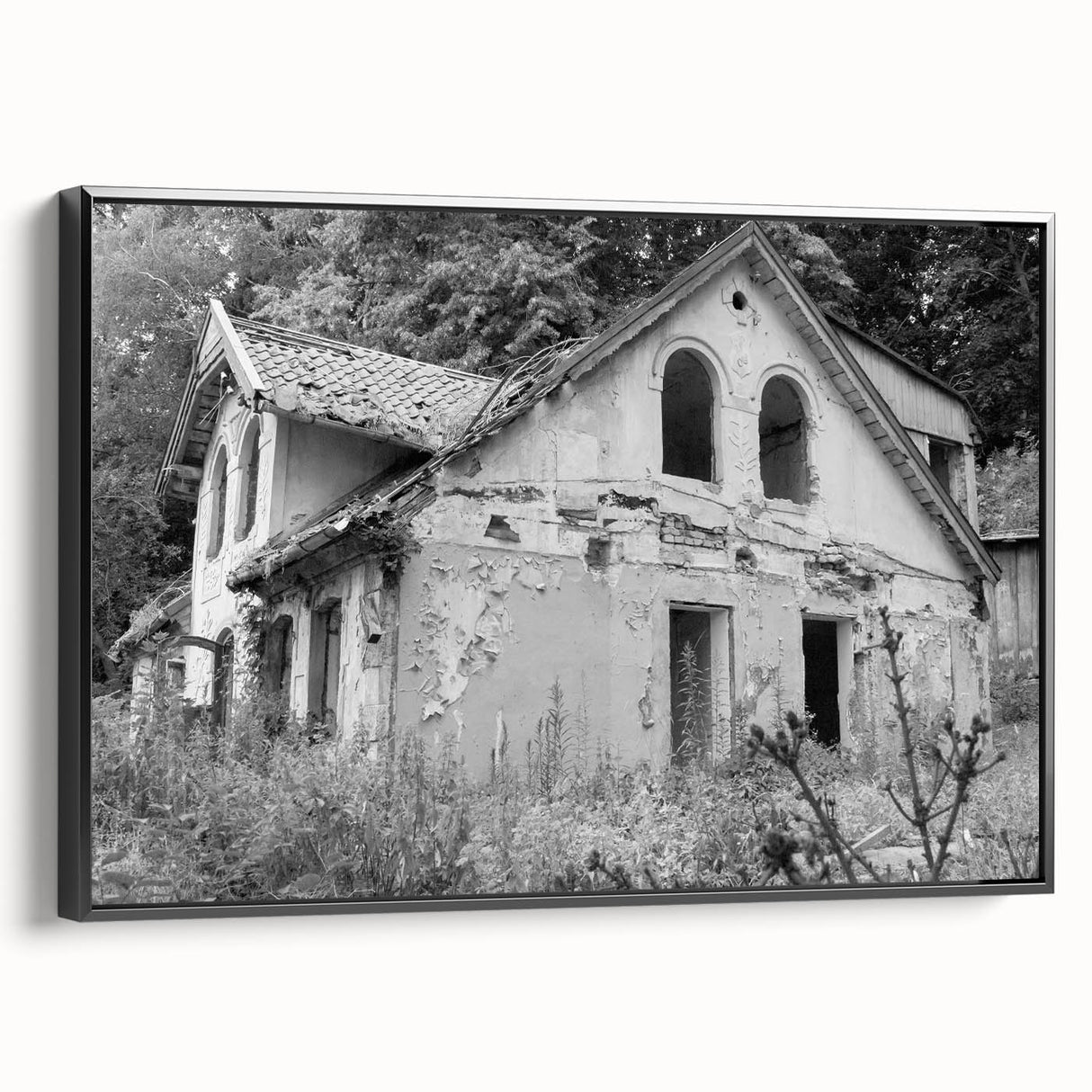 Vintage poster art of a derelict building in vibrant colors on a large framed canvas, ideal for living room decor.