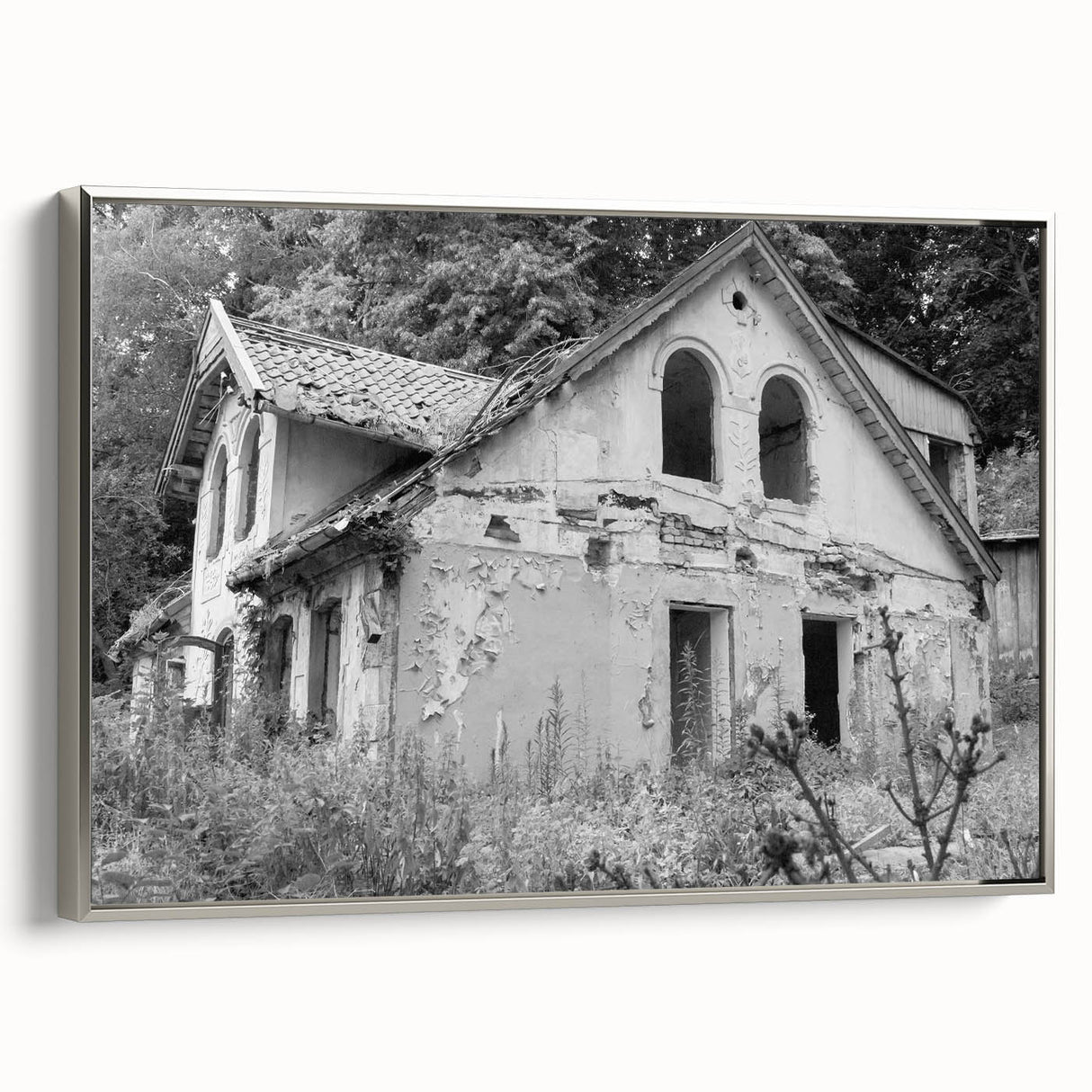 Silver-framed canvas featuring a black and white vintage landscape painting, ideal for bedroom wall art.