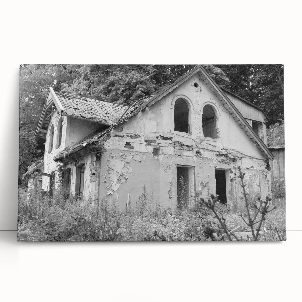 Large black and white photo of a dilapidated building on stretched canvas, suitable as kitchen wall art or for a bedroom.