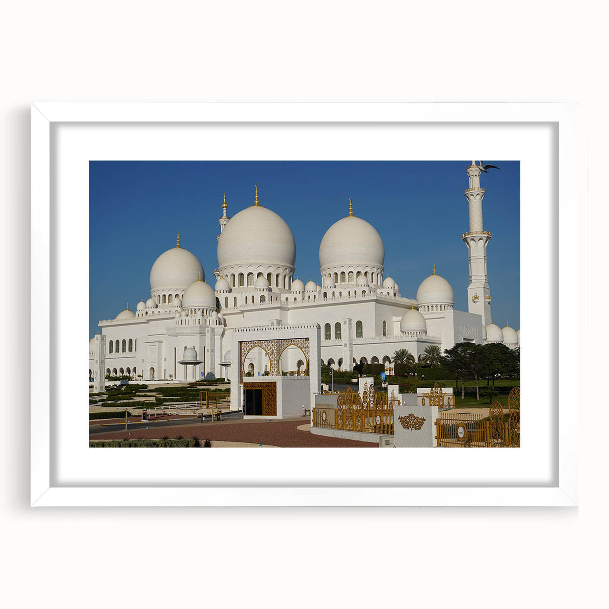 Abstract art print featuring geometric domes in muted gray and blue tones, framed with a white mat.