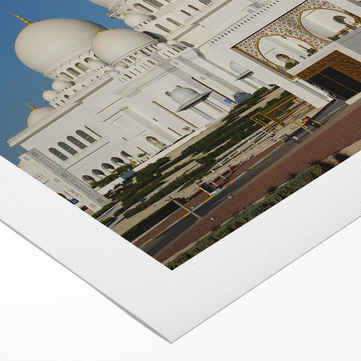 Art Deco poster featuring geometric patterns and metallic gold and black hues on rolled canvas.