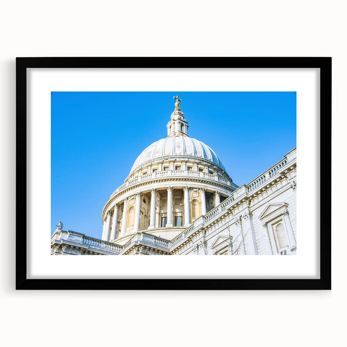 Abstract art print featuring colorful, textured domes on a large canvas, framed in black, suitable for living room decor.