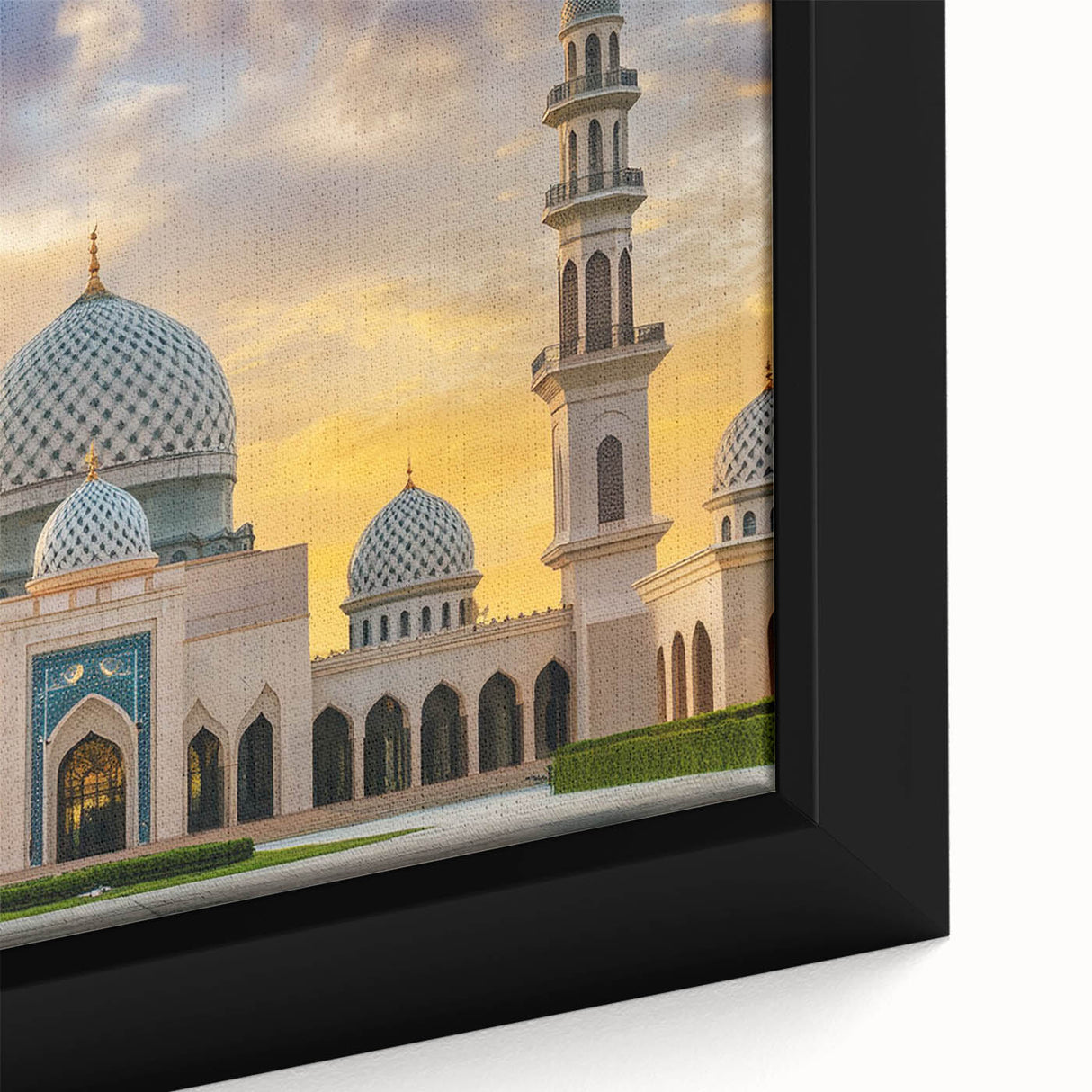 Close-up of a framed canvas featuring black wall art with colorful, textured architectural domes.