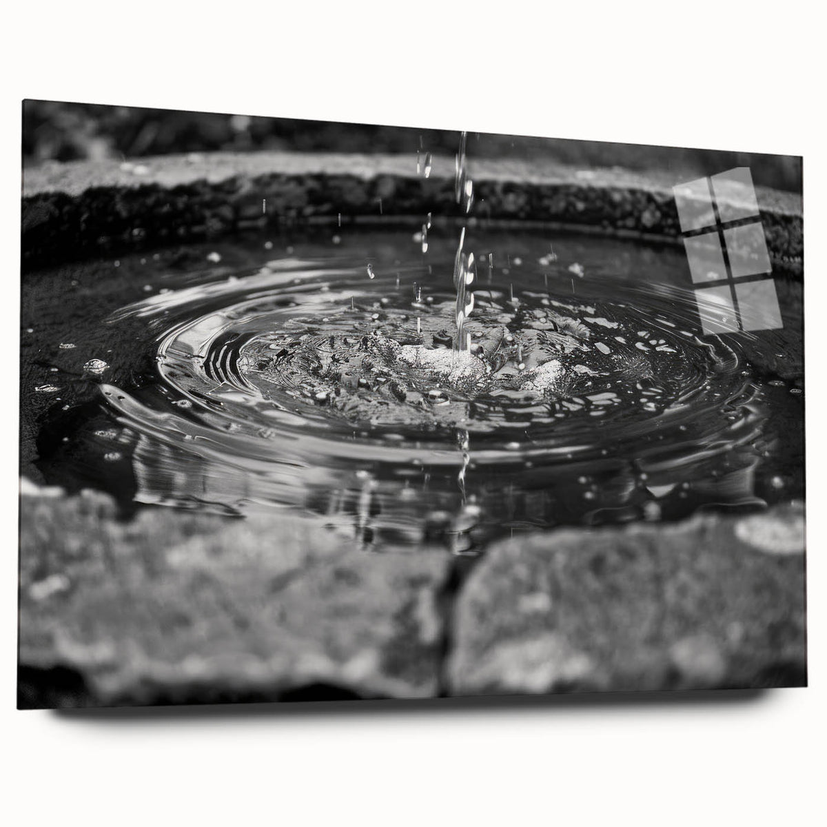 Large abstract wall art on acrylic glass depicting a modern fountain design in muted blue and gray tones.